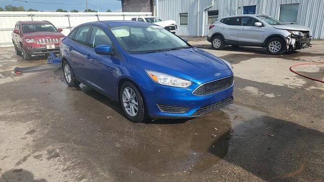 2018 Ford Focus Se VIN: 1FADP3F29JL319071 Lot: 65356895