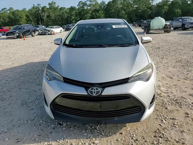 2017 Toyota Corolla L VIN: 5YFBURHE3HP702011 Lot: 65202125