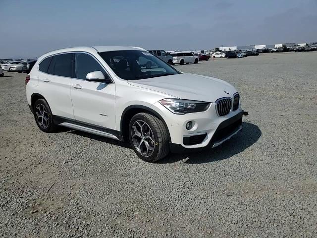 2018 BMW X1 xDrive28I VIN: WBXHT3C30J5K32414 Lot: 64701095
