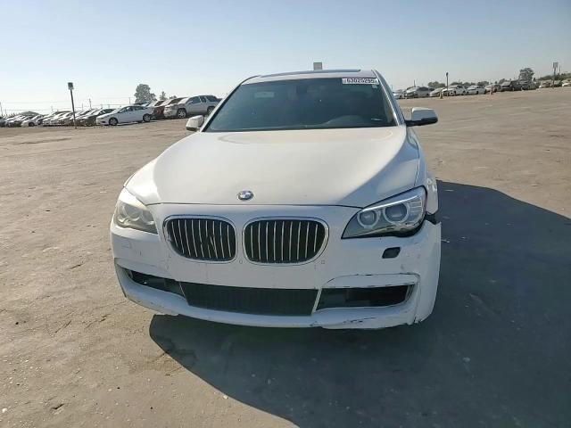 2014 BMW 740 I VIN: WBAYA6C54ED144402 Lot: 63025295