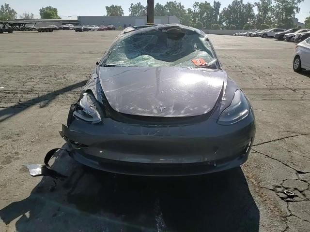 2022 Tesla Model 3 VIN: 5YJ3E1EA2NF209562 Lot: 64623495