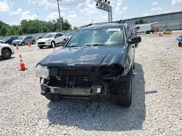 2009 Jeep Grand Cherokee Laredo VIN: 1J8GR48K39C506671 Lot: 64466725