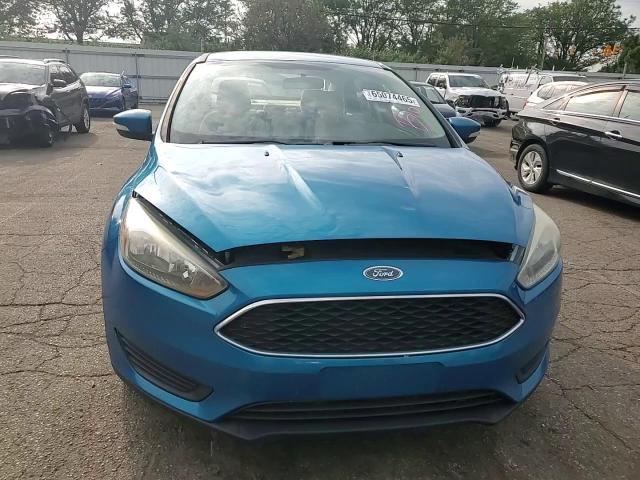 2015 Ford Focus Se VIN: 1FADP3F20FL311433 Lot: 65074465