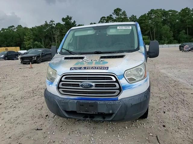 2015 Ford Transit Cargo Van T- VIN: 1FTNR1ZM9FKA47077 Lot: 63319935