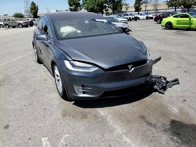 2016 Tesla Model X VIN: 5YJXCBE2XGF021798 Lot: 65811465