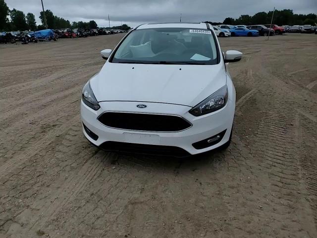 2018 Ford Focus Sel VIN: 1FADP3M21JL314112 Lot: 64640435