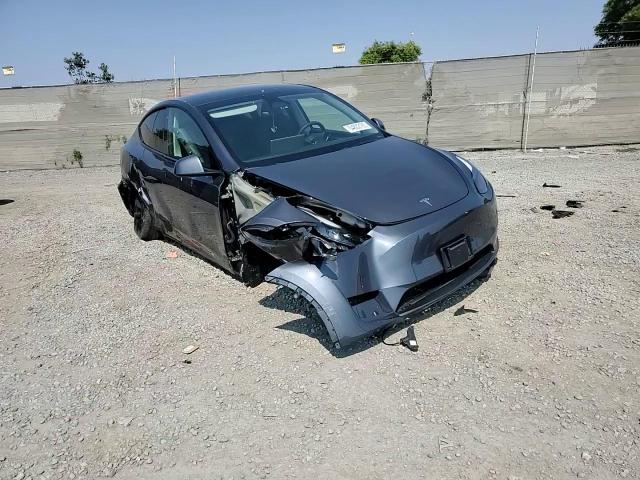 2023 Tesla Model Y VIN: 7SAYGAEE1PF772109 Lot: 64802185