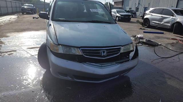 2002 Honda Odyssey Exl VIN: 2HKRL18062H586816 Lot: 63741845
