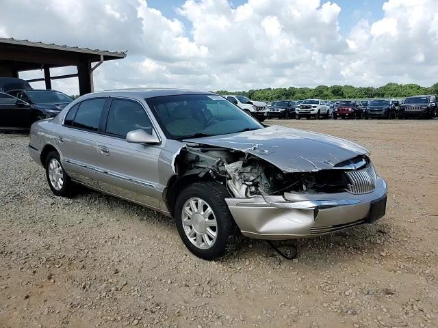 2001 Lincoln Continental VIN: 1LNHM97V71Y711271 Lot: 64003305