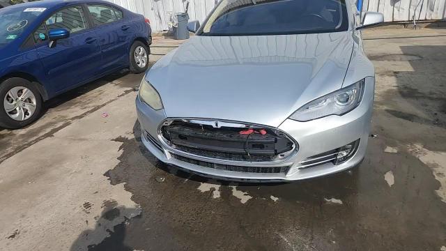 2014 Tesla Model S VIN: 5YJSA1H11EFP65171 Lot: 65931255