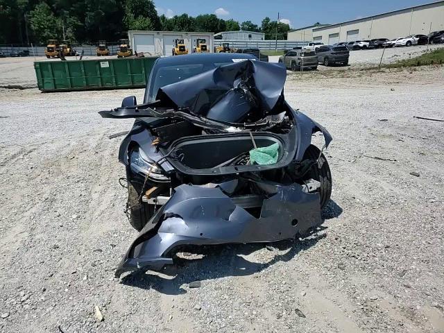 2021 Tesla Model Y VIN: 5YJYGDEE8MF084702 Lot: 63570125