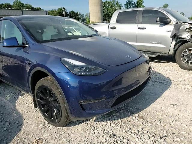 2024 Tesla Model Y VIN: 7SAYGAEE7RF981874 Lot: 65233805