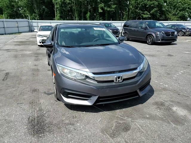 2018 Honda Civic Lx VIN: 19XFC2F5XJE022113 Lot: 64818535