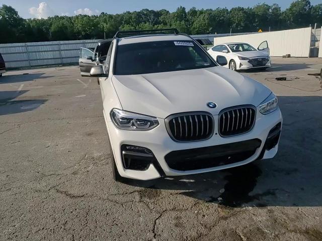 2021 BMW X3 xDrivem40I VIN: 5UXTY9C01M9F63034 Lot: 64205035