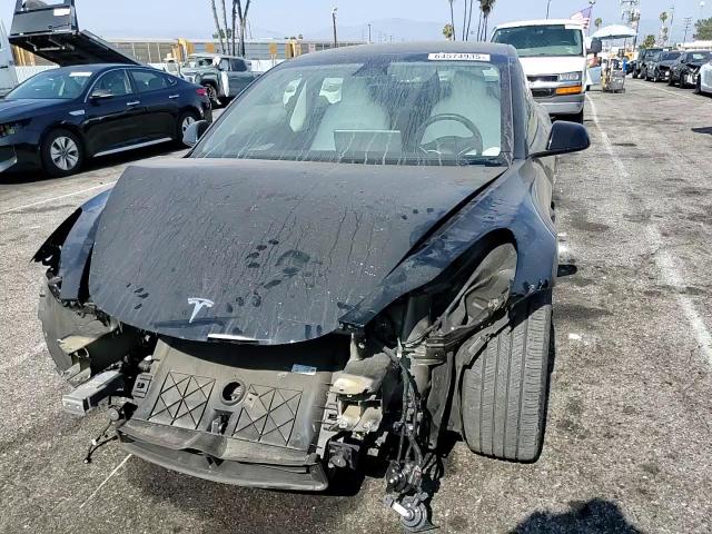 2023 Tesla Model 3 VIN: 5YJ3E1EA8PF565520 Lot: 64574935