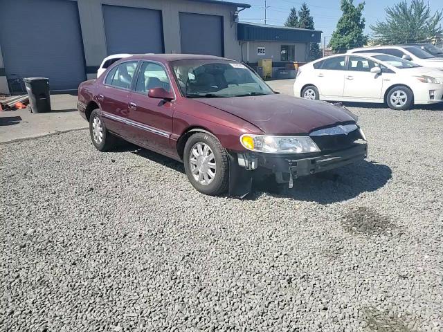 2000 Lincoln Continental VIN: 1LNHM97V0YY885600 Lot: 64902215