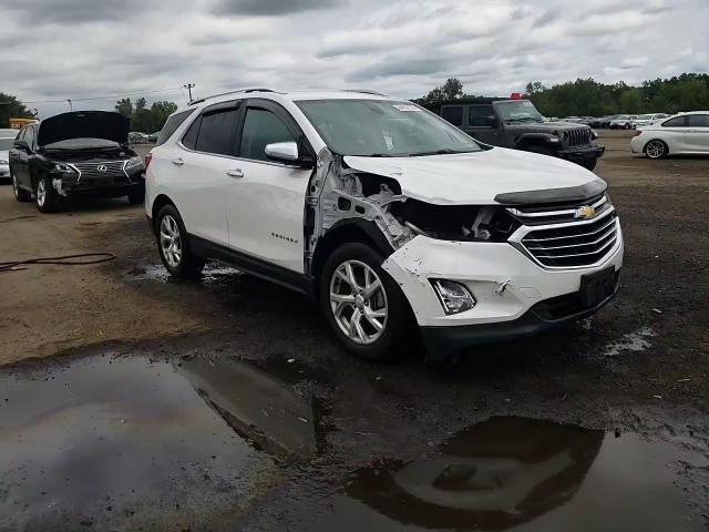 2018 Chevrolet Equinox Premier VIN: 2GNAXVEV6J6306010 Lot: 64092035