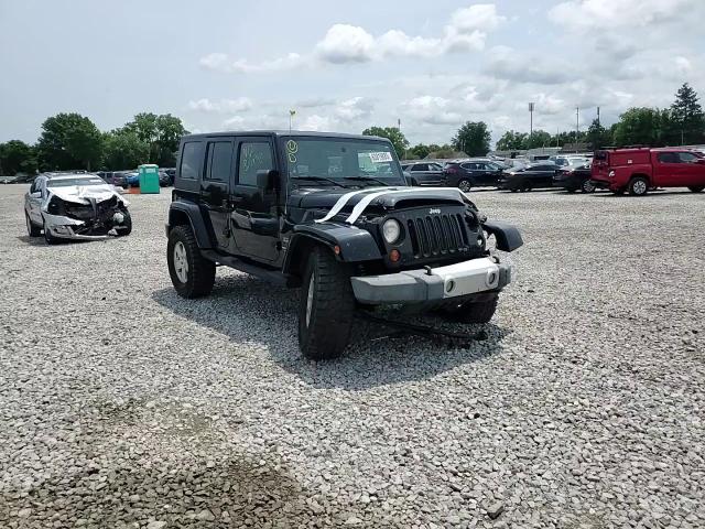 2010 Jeep Wrangler Unlimited Sahara VIN: 1J4BA5H17AL214834 Lot: 63819885