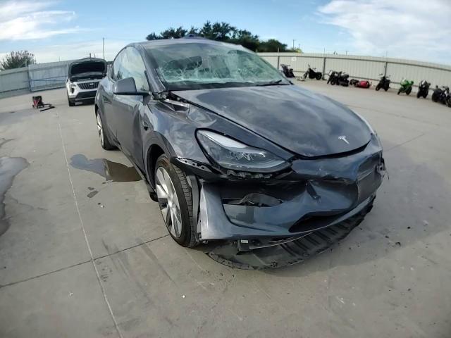 2023 Tesla Model Y VIN: 7SAYGAEE8PF894014 Lot: 65612225