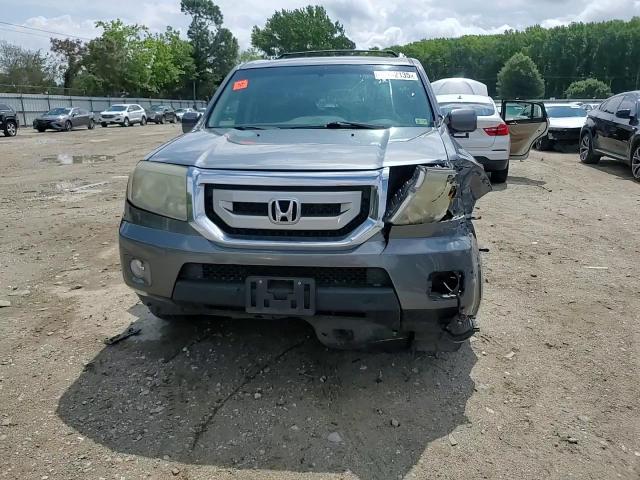 2011 Honda Pilot Exln VIN: 5FNYF4H71BB063378 Lot: 63242135