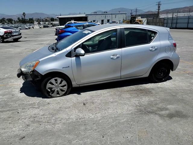 2014 Toyota Prius C VIN: JTDKDTB32E1562893 Lot: 64335205