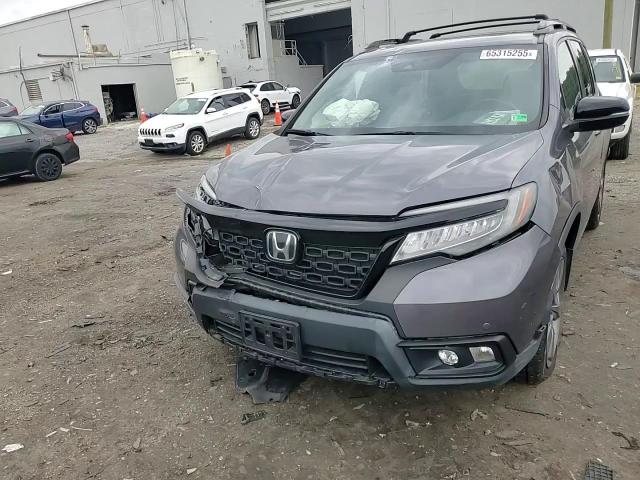 2020 Honda Passport Touring VIN: 5FNYF8H9XLB007353 Lot: 65315255