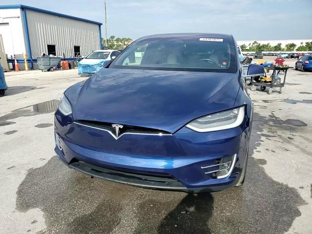 2020 Tesla Model X VIN: 5YJXCDE20LF297896 Lot: 64361025