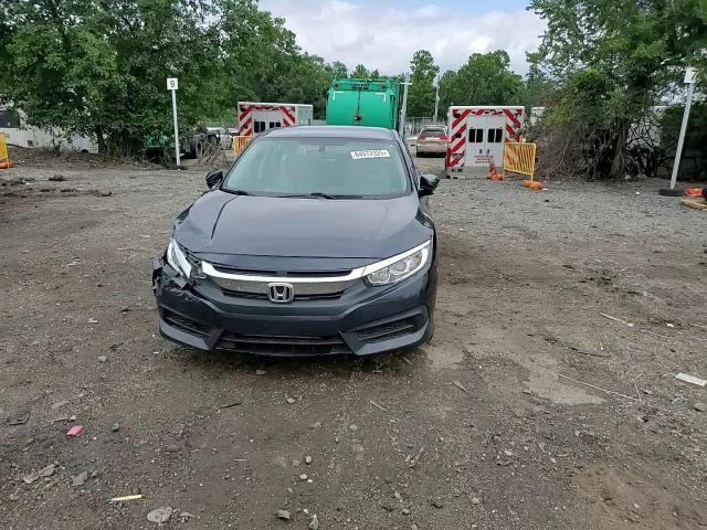 2018 Honda Civic Lx VIN: 2HGFC2F50JH533335 Lot: 64072325