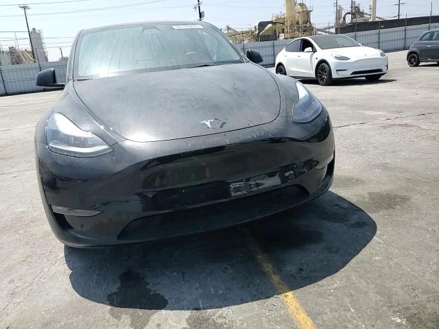 2023 Tesla Model Y VIN: 7SAYGAEE6PF796339 Lot: 63155255