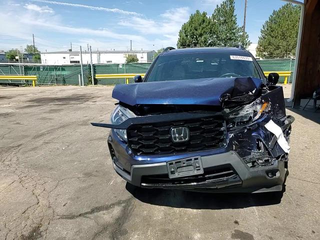 2023 Honda Passport Elite VIN: 5FNYF8H02PB017947 Lot: 63519435