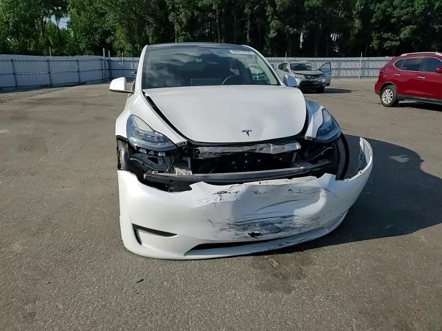 2023 Tesla Model Y VIN: 7SAYGDEE2PA039968 Lot: 60979735