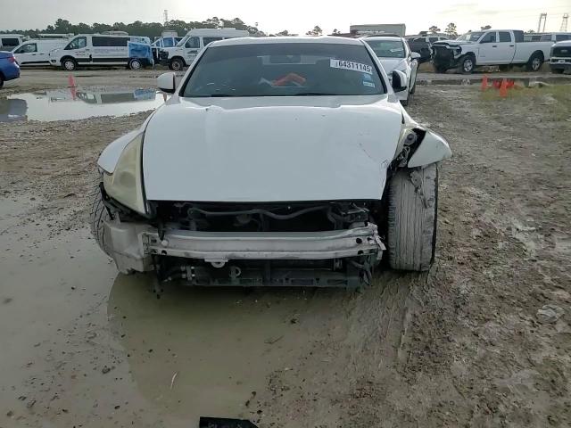 2009 Nissan 370Z VIN: JN1AZ44E19M410242 Lot: 64311145