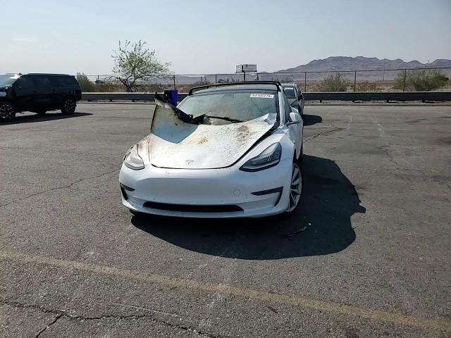 2019 Tesla Model 3 VIN: 5YJ3E1EB1KF513406 Lot: 64105175