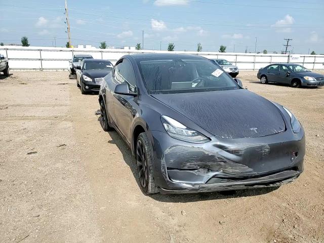 2023 Tesla Model Y VIN: 7SAYGDEE0PA031593 Lot: 64702815