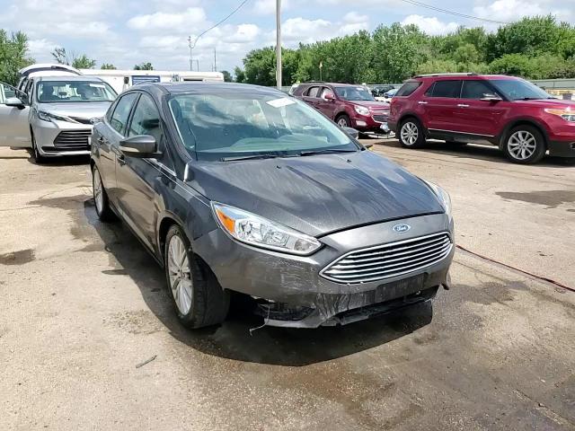 2015 Ford Focus Titanium VIN: 1FADP3J29FL293280 Lot: 65243455