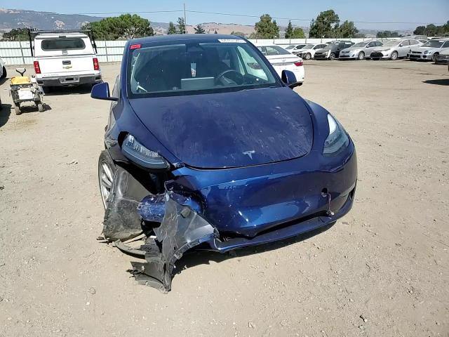 2022 Tesla Model Y VIN: 7SAYGAEE6NF573991 Lot: 64767545