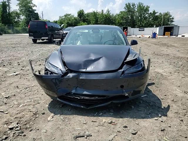 2025 Tesla Model 3 VIN: 5YJ3E1EA8SF011810 Lot: 64189555