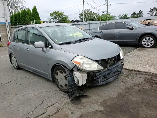 2009 Nissan Versa S VIN: 3N1BC13E99L398129 Lot: 64327985