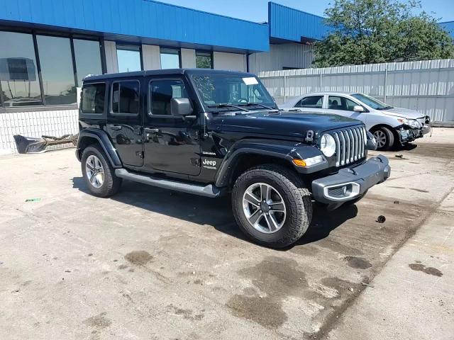 2019 Jeep Wrangler Unlimited Sahara VIN: 1C4HJXEGXKW555777 Lot: 63083565