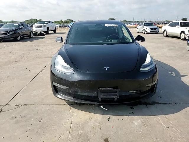 2019 Tesla Model 3 VIN: 5YJ3E1EB9KF477271 Lot: 65025785