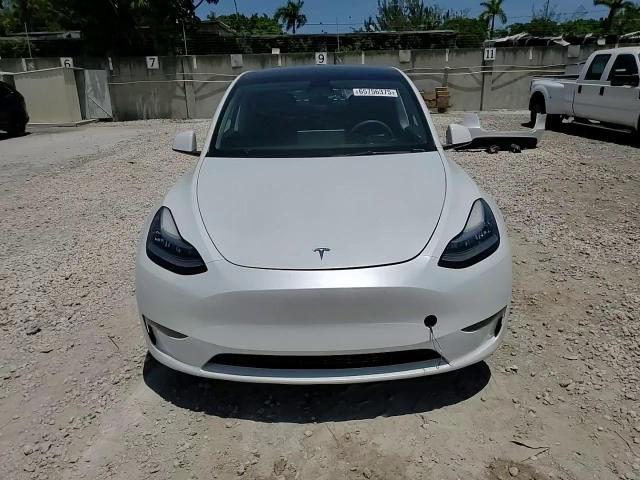 2023 Tesla Model Y VIN: 7SAYGDEEXPA099335 Lot: 65756375