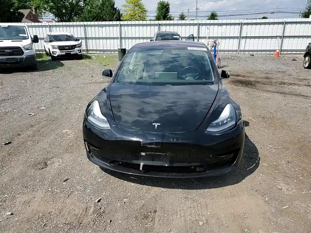 2019 Tesla Model 3 VIN: 5YJ3E1EB2KF197014 Lot: 63314465