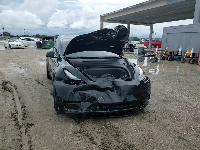 2024 Tesla Model Y VIN: 7SAYGDEF7RF045702 Lot: 63604495