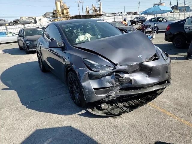 2023 Tesla Model Y VIN: 7SAYGDEF9PF603028 Lot: 65285335