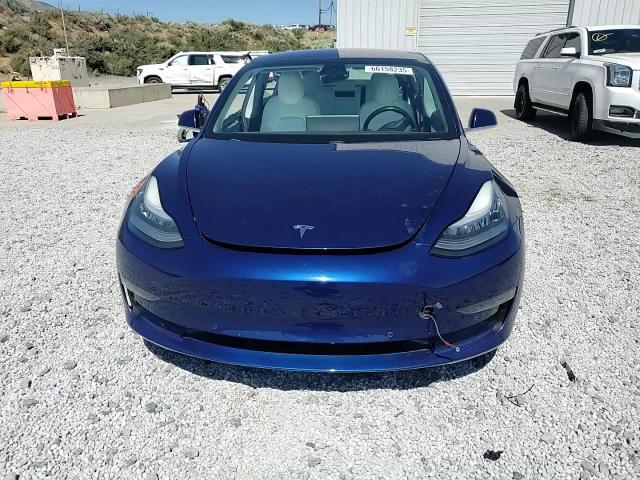 2018 Tesla Model 3 VIN: 5YJ3E1EB5JF086147 Lot: 66158235