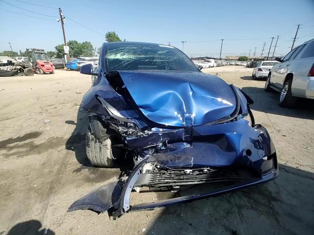2023 Tesla Model Y VIN: 7SAYGDEE8PA207726 Lot: 66963545