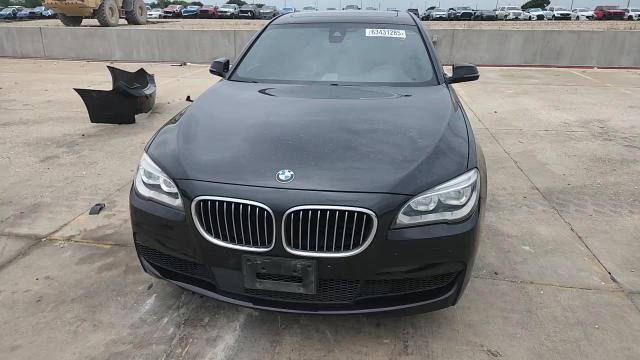 2015 BMW 750 I VIN: WBAYA8C54FG197788 Lot: 63431285
