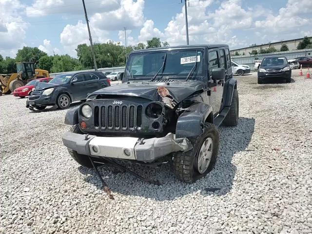 2010 Jeep Wrangler Unlimited Sahara VIN: 1J4BA5H17AL214834 Lot: 63819885