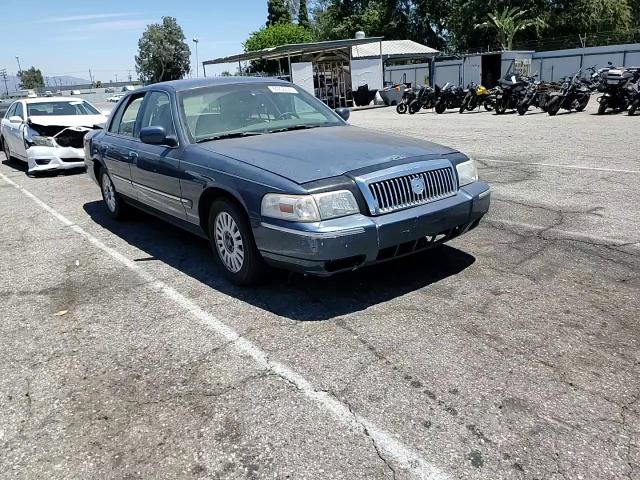 2007 Mercury Grand Marquis Ls VIN: 2MEFM75V77X627106 Lot: 64208375