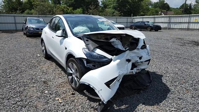2023 Tesla Model Y VIN: 7SAYGAEE2PF782762 Lot: 64819315